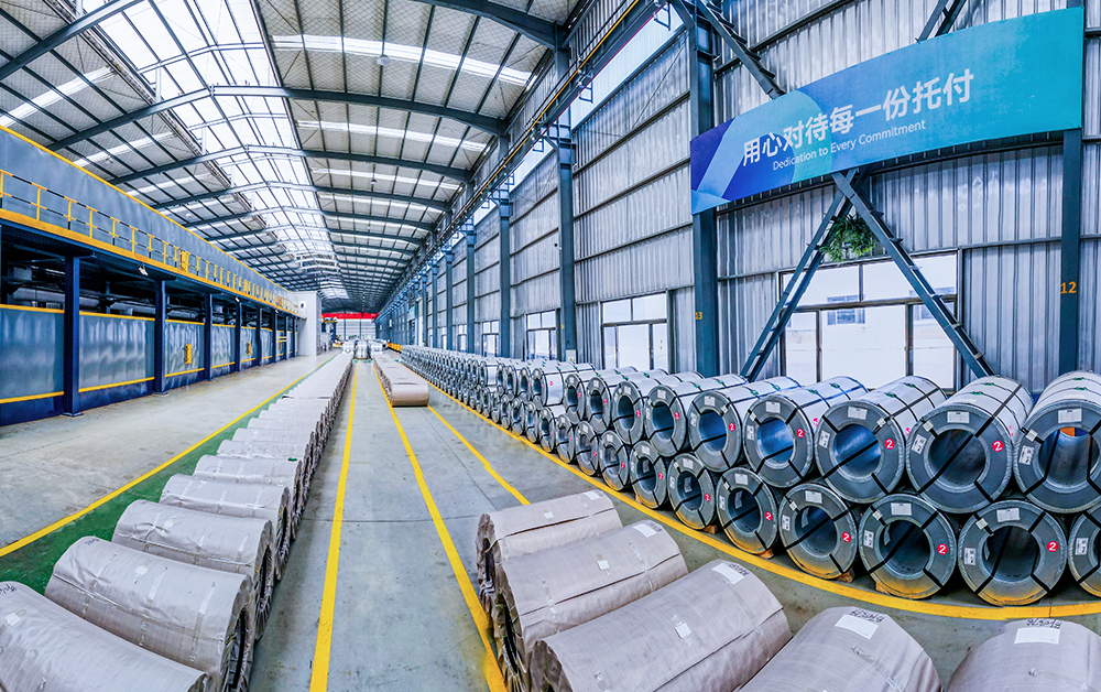 Steel coils stored inside a large production facility
