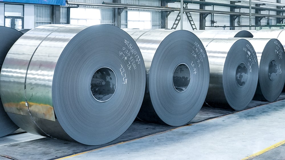 Rows of cold-rolled steel coils in the production facility